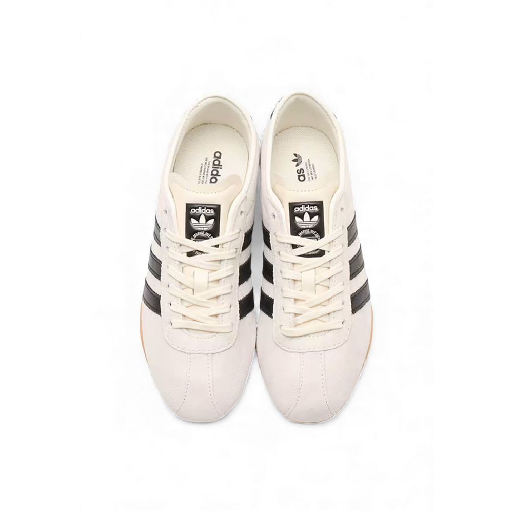 Baskets athlétiques en suède noir et blanc Adidas Originals