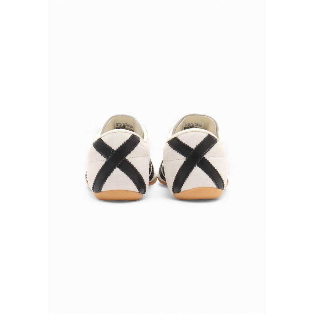 Baskets athlétiques en suède noir et blanc Adidas Originals